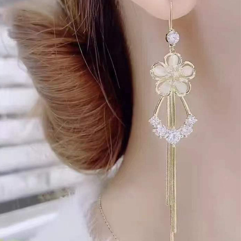 New cat's eye stone earrings fashion temperament long tassels show thin face earrings