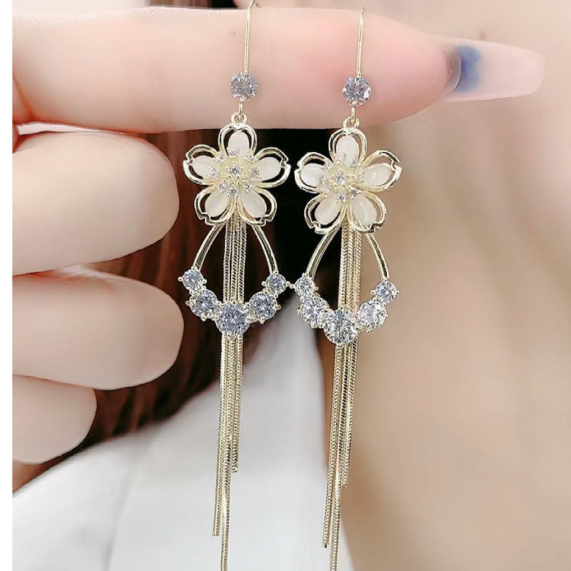 New cat's eye stone earrings fashion temperament long tassels show thin face earrings
