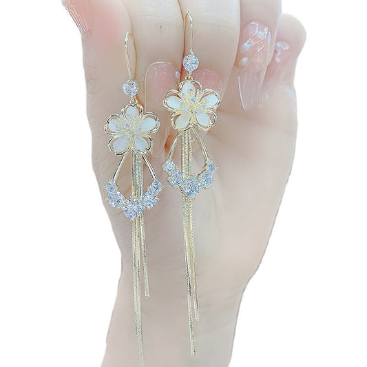 New cat's eye stone earrings fashion temperament long tassels show thin face earrings