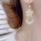 New cat's eye stone earrings fashion temperament long tassels show thin face earrings